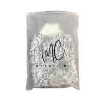 Microfibre wash mitt worn on hand