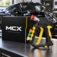 MCX Black Spray Gun 5000 PSI and box in a detailing studio