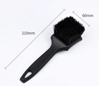 Tyre scrubbing brush with ergonomic handle